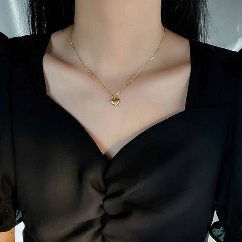 Collier en or avec un pendentif en forme de cœur