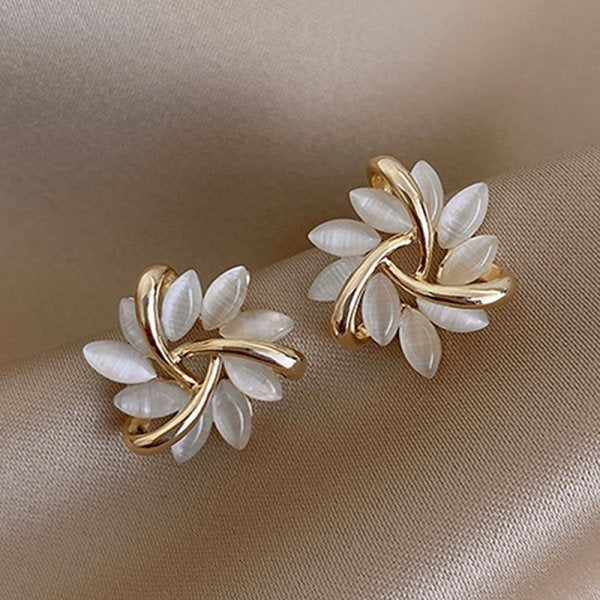 Boucles d'oreilles avec des perles imitation