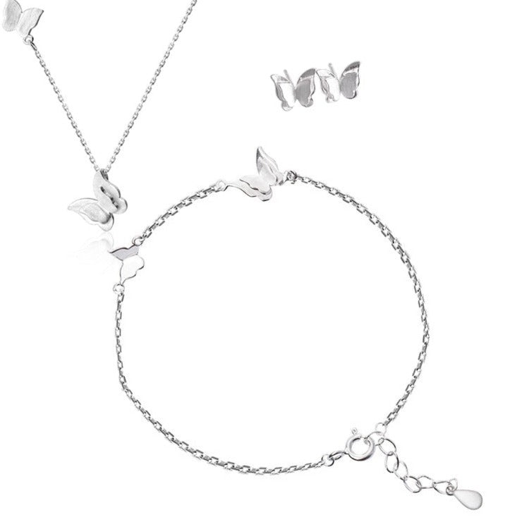 Ensemble de bijoux avec un motif de papillon