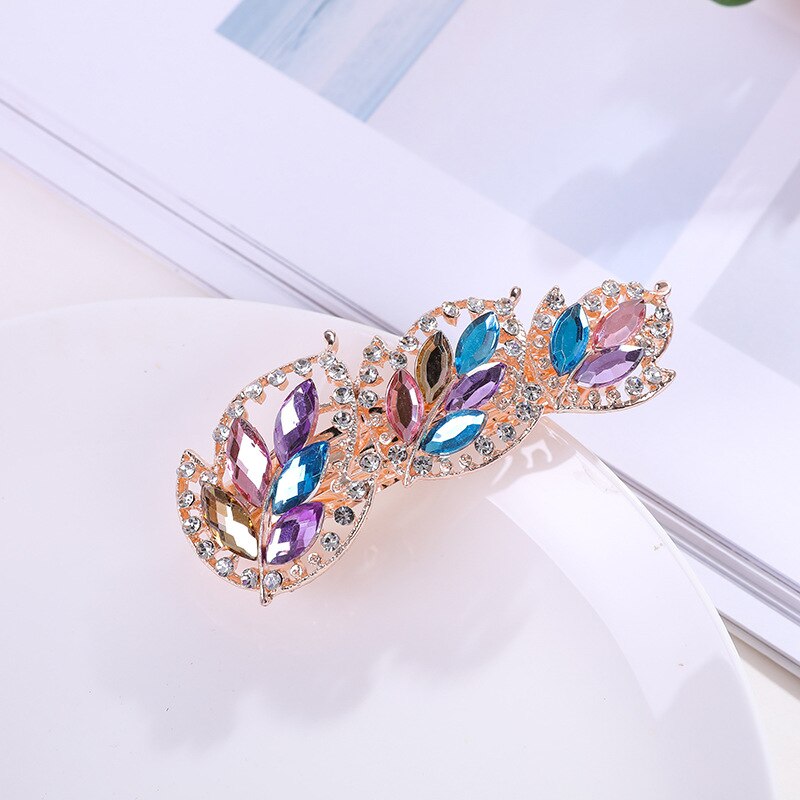 Barrette capillaire avec motif de feuille