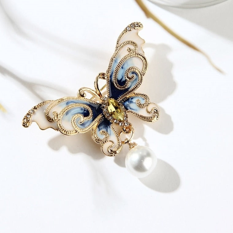 Broche en marbre papillon