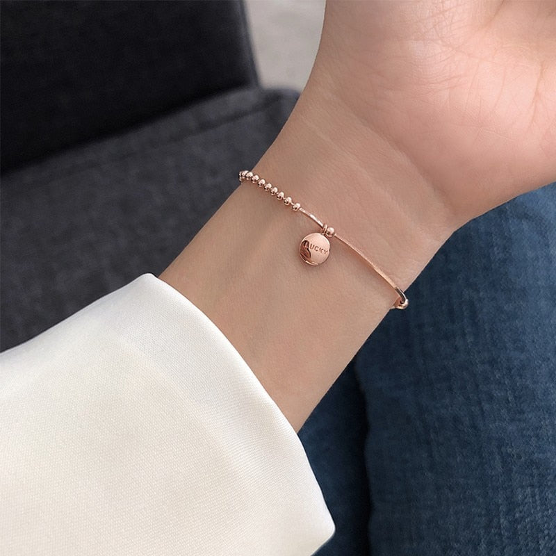 Bracelet avec un porte-bonheur