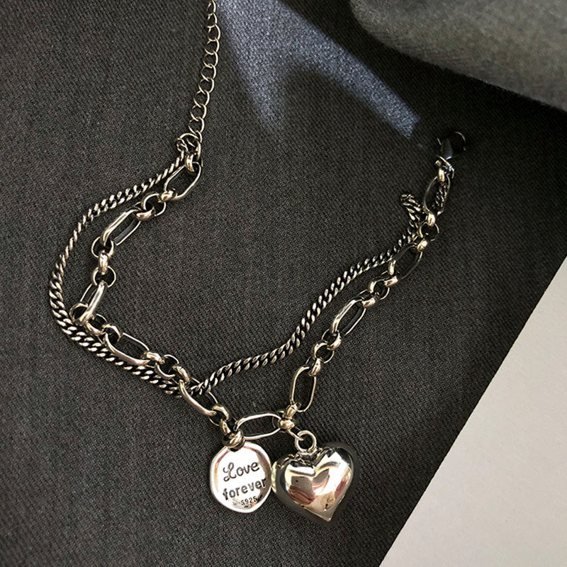 Double bracelet with pendants -> Double bracelet avec pendentifs