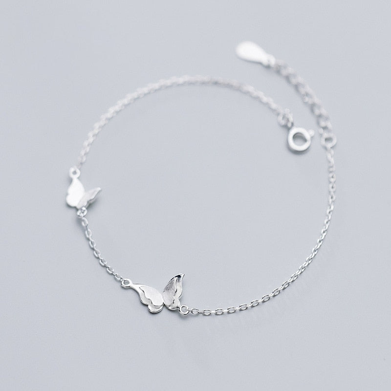 Ensemble de bijoux avec un motif de papillon