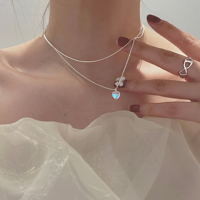Collier double avec pendentif en forme de cœur