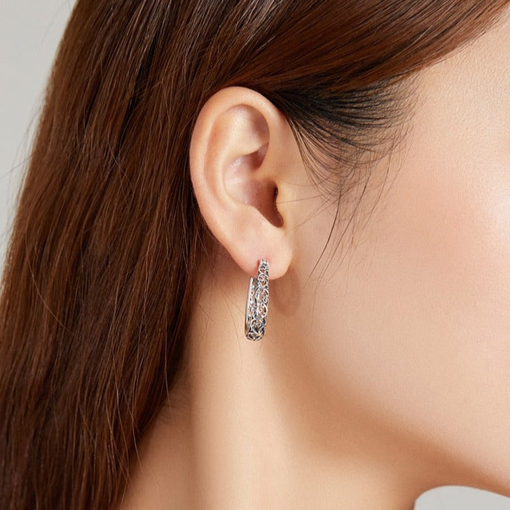Boucles d'oreilles suspendues ajourées