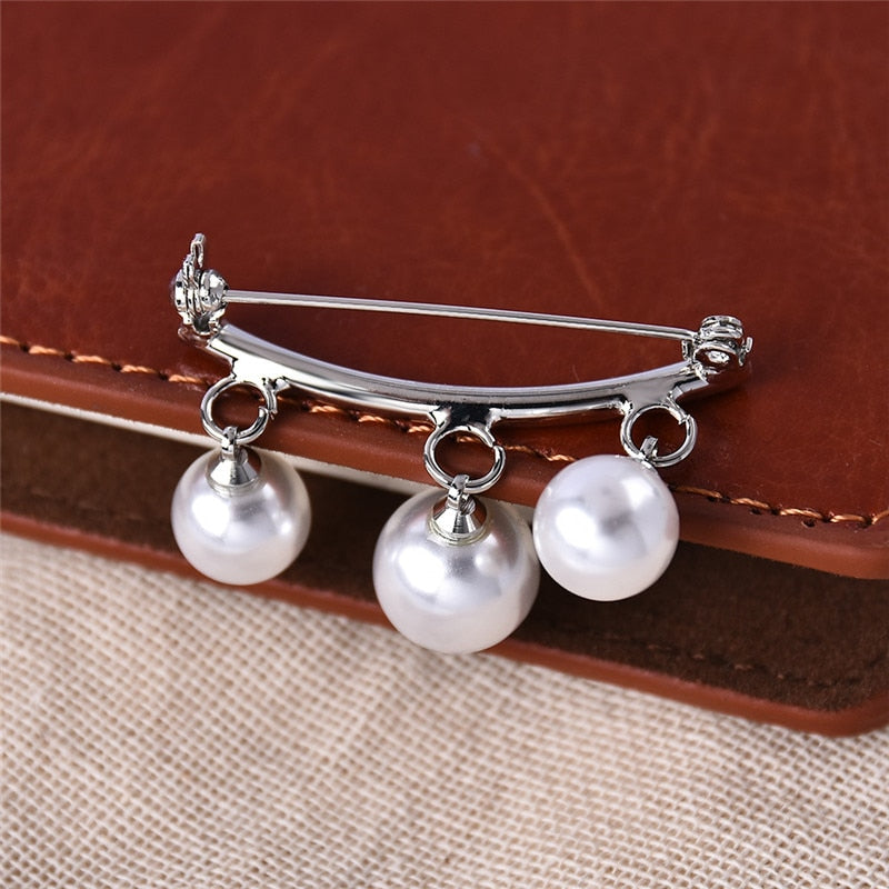 Épingle avec des perles imitation