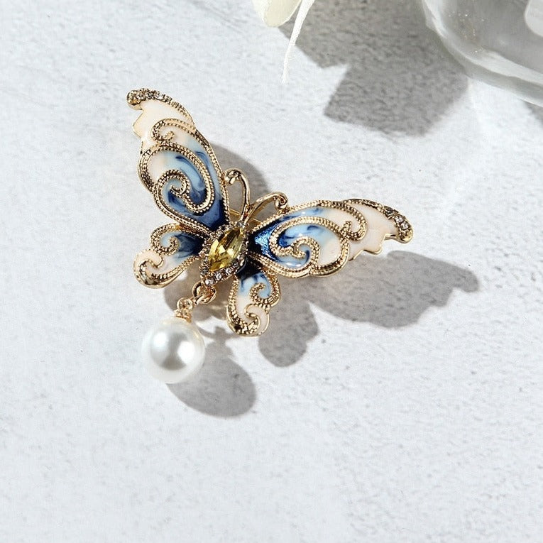 Broche en marbre papillon