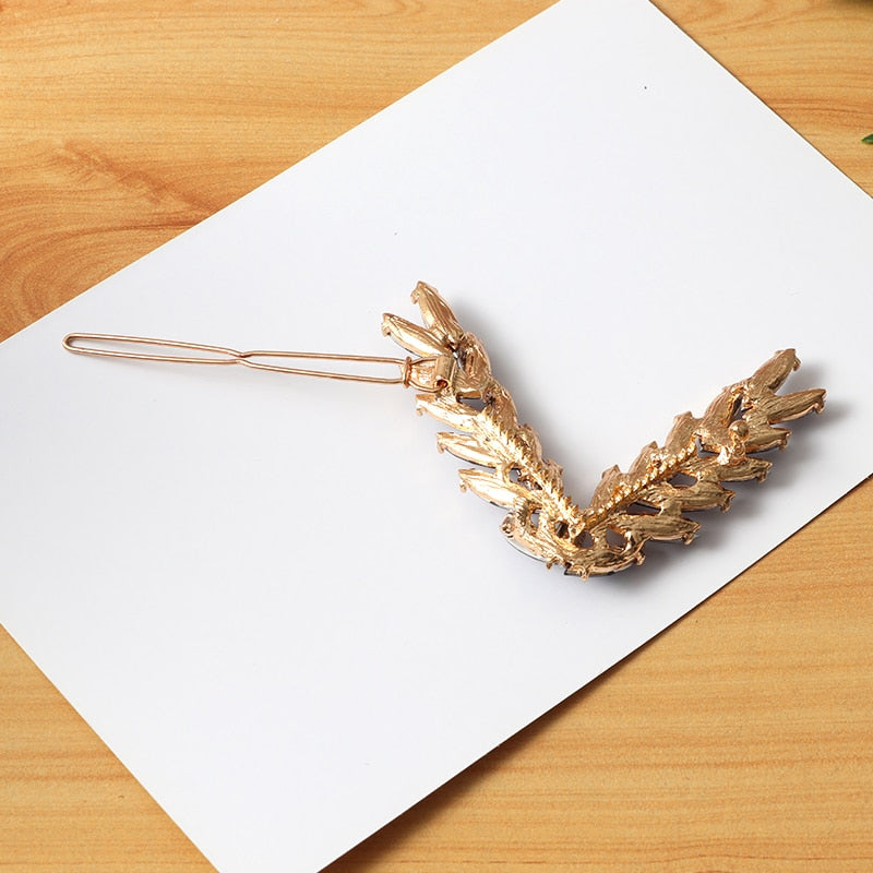 Pince à cheveux en forme de lettre "V"