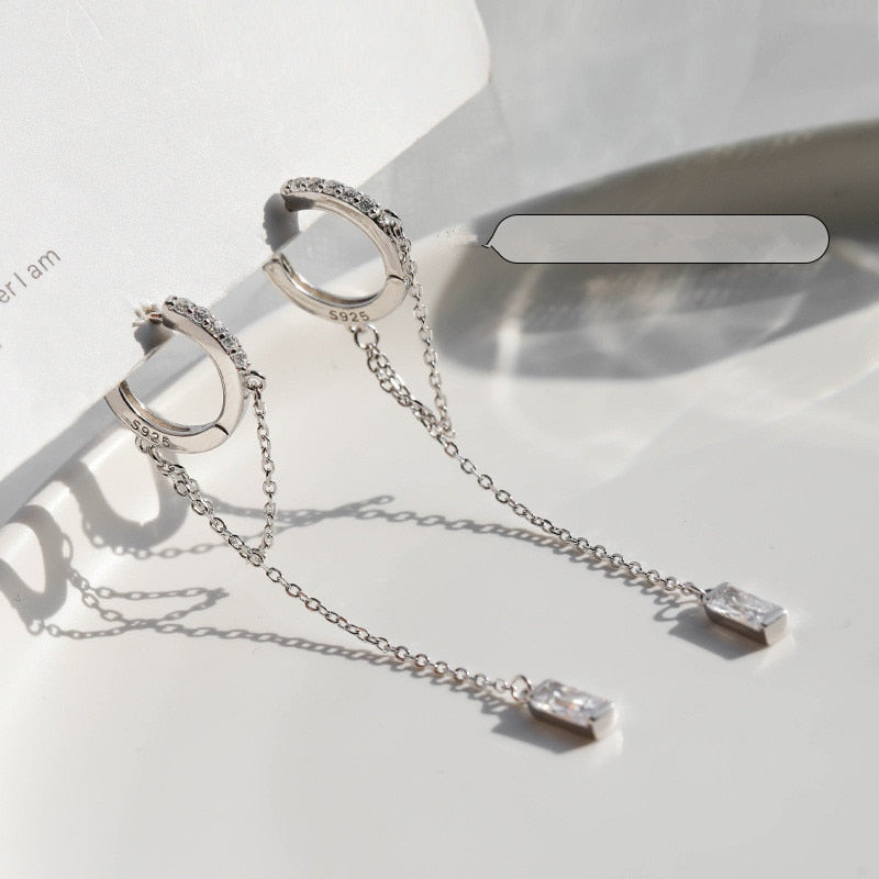Boucles d'oreilles en argent avec une chaîne