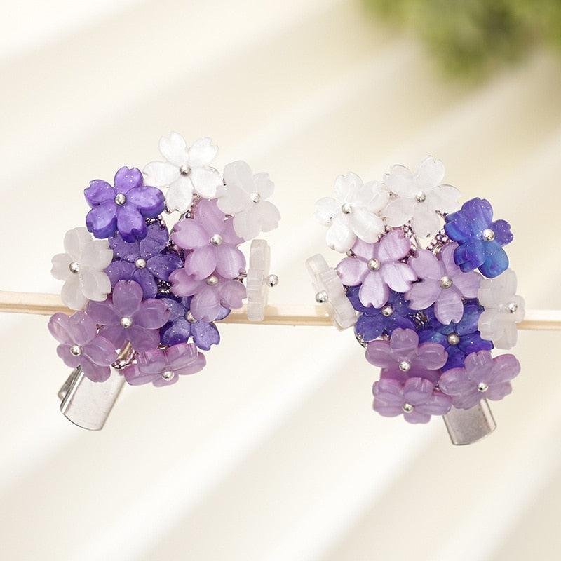 Épingles à cheveux avec des fleurs violettes