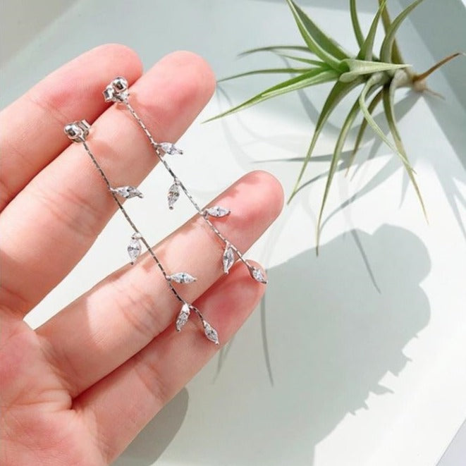 Boucles d'oreilles avec motif de feuille