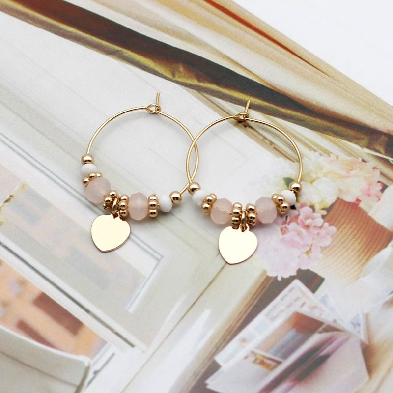 Boucles d'oreilles pendantes avec pendentifs