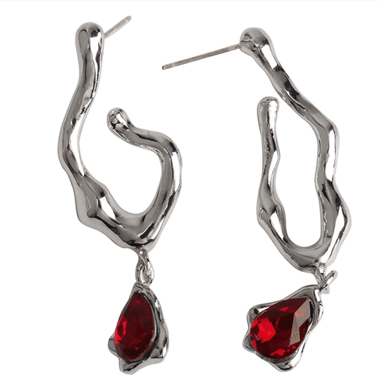 Boucles d'oreilles pendantes avec une pierre