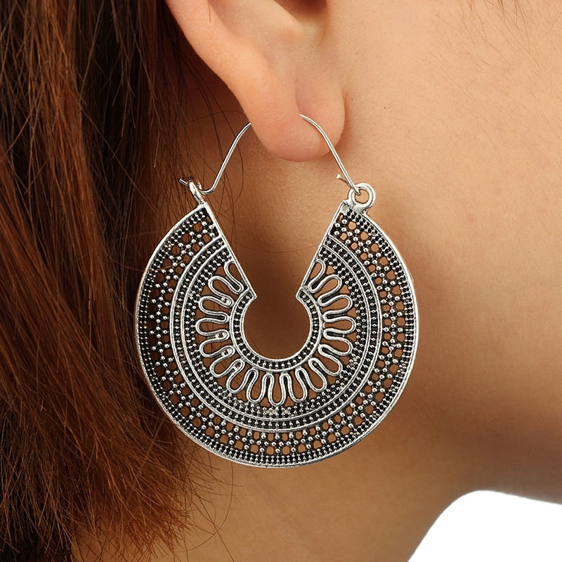 Boucles d'oreilles avec motif aztèque