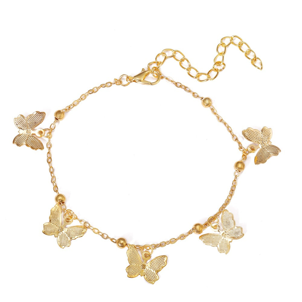 Bracelet de cheville avec pendentifs papillon