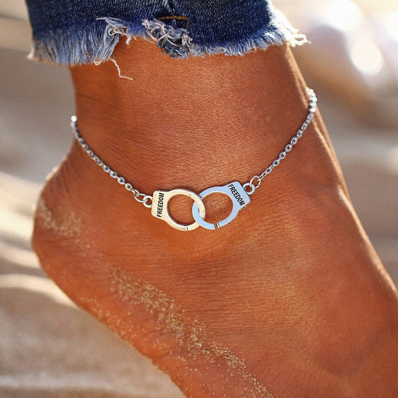 Bracelet de cheville avec motif menotte