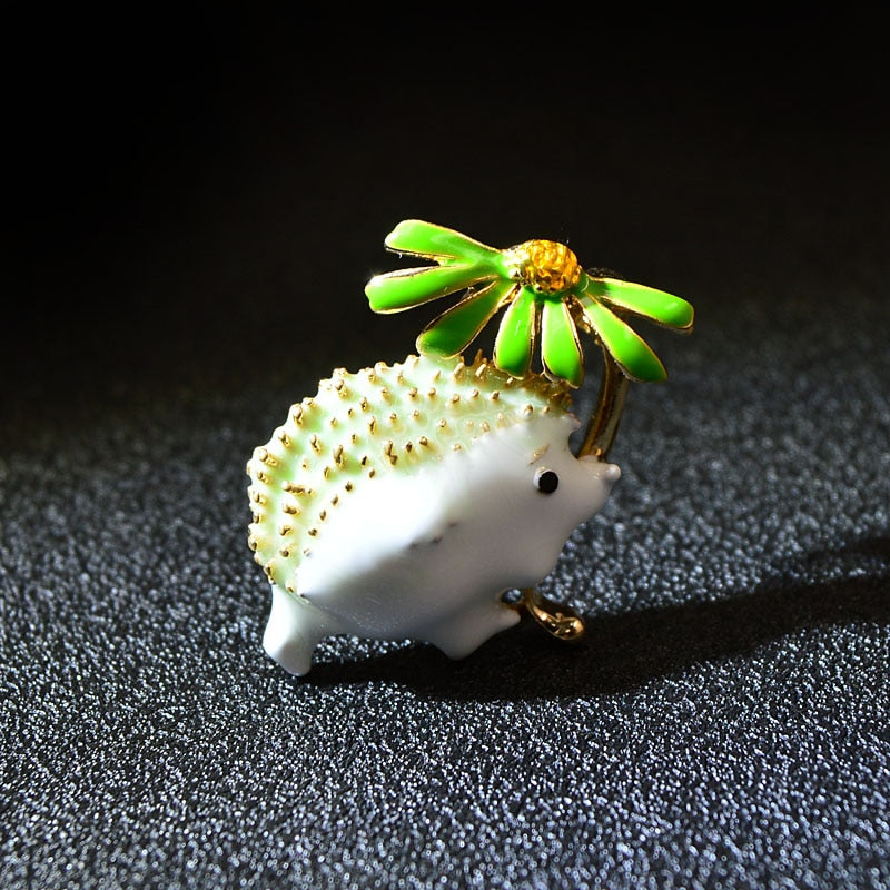 Épingle - hérisson avec une fleur