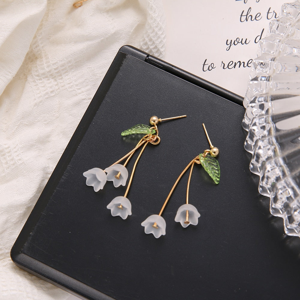 Boucles d'oreilles en acrylique de lys