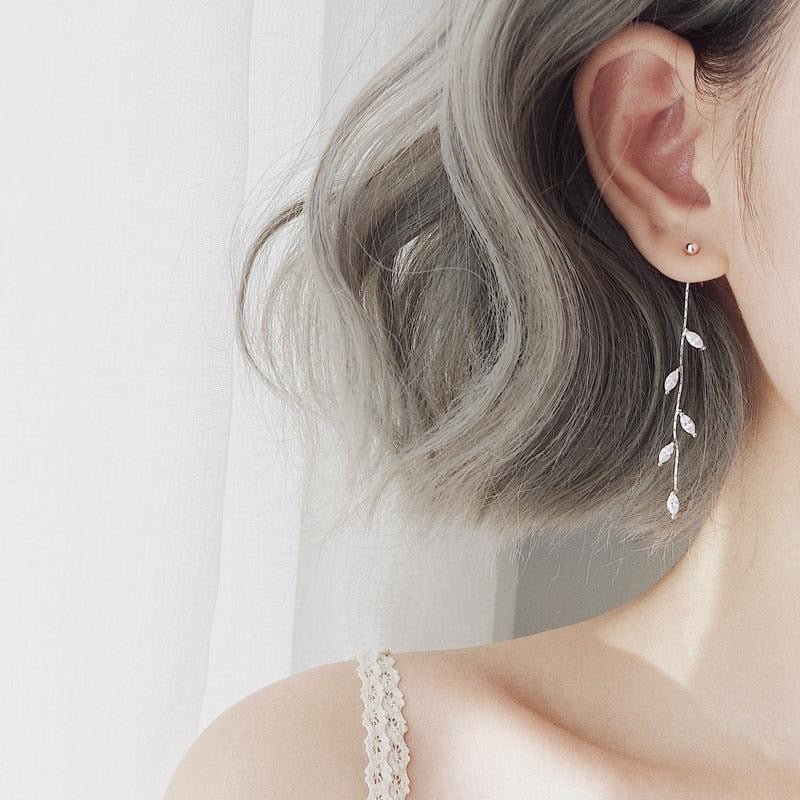 Boucles d'oreilles avec motif de feuille