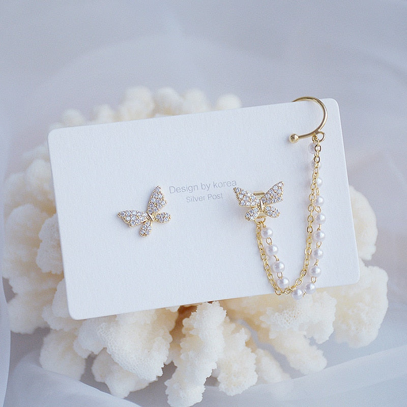 Boucles d'oreilles avec un motif de papillon
