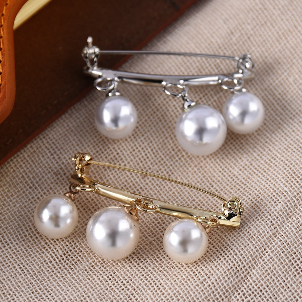Épingle avec des perles imitation