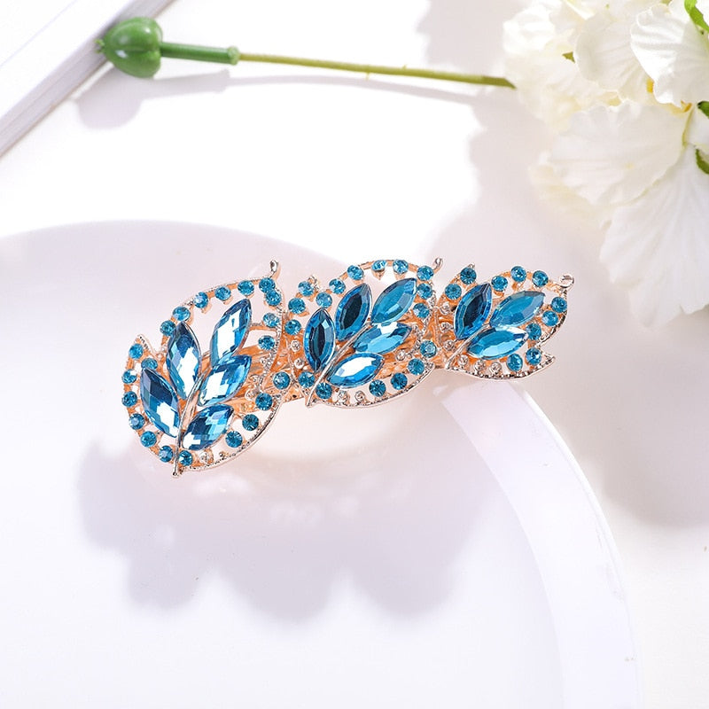 Barrette capillaire avec motif de feuille