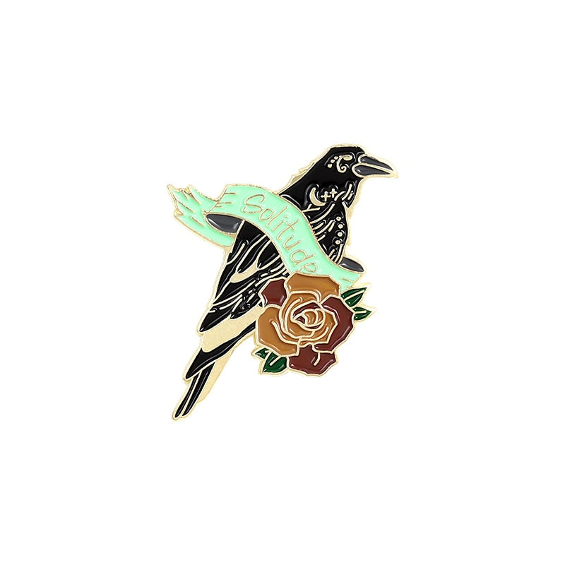 Broche - corbeau avec une rose