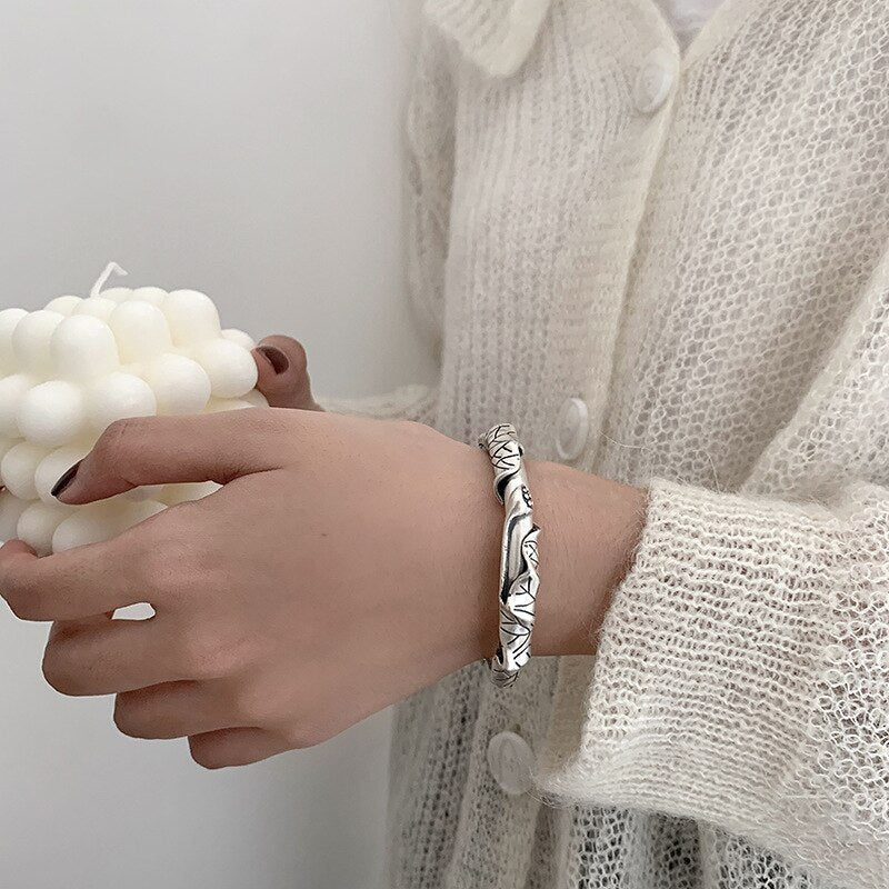 Bracelet avec un motif de plante