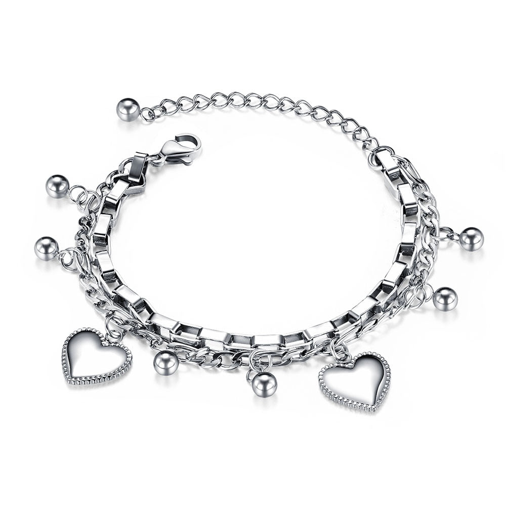 Bracelet avec pendentifs - cœurs