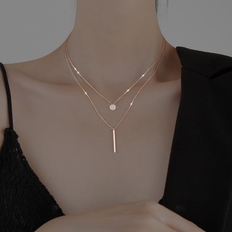 Collier double avec pendentifs
