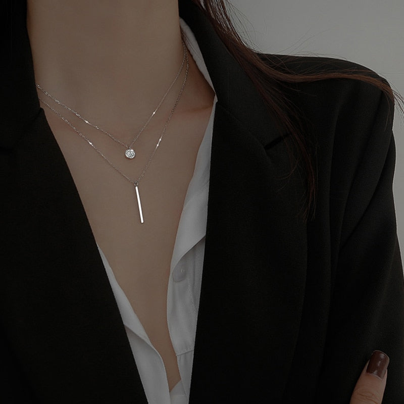 Collier double avec pendentifs