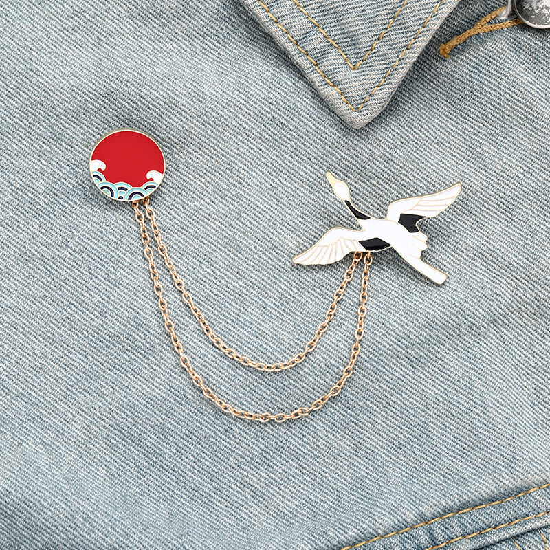 Épingle avec une chaîne - oiseau