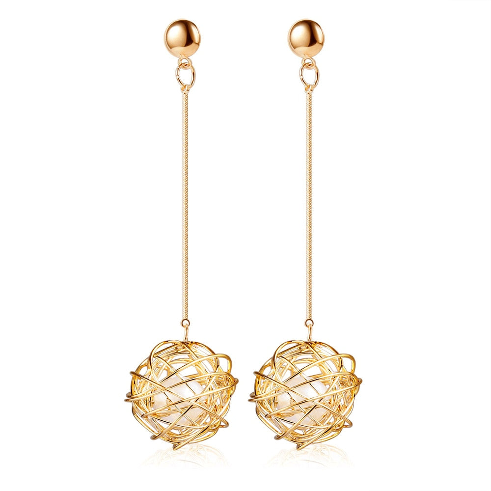 Boucles d'oreilles à boules suspendues