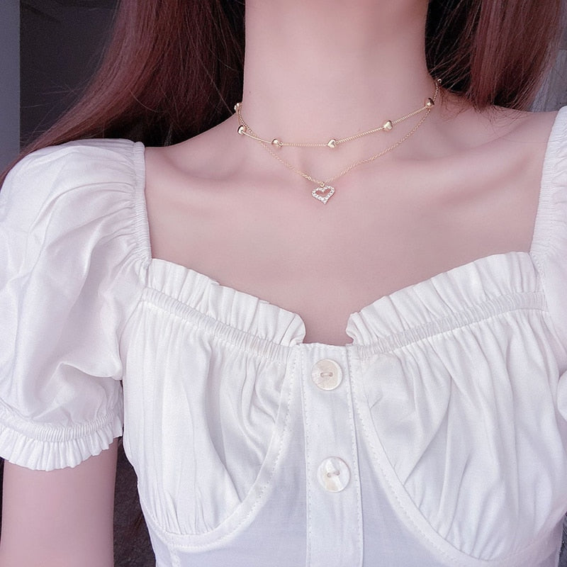 Collier double - cœurs