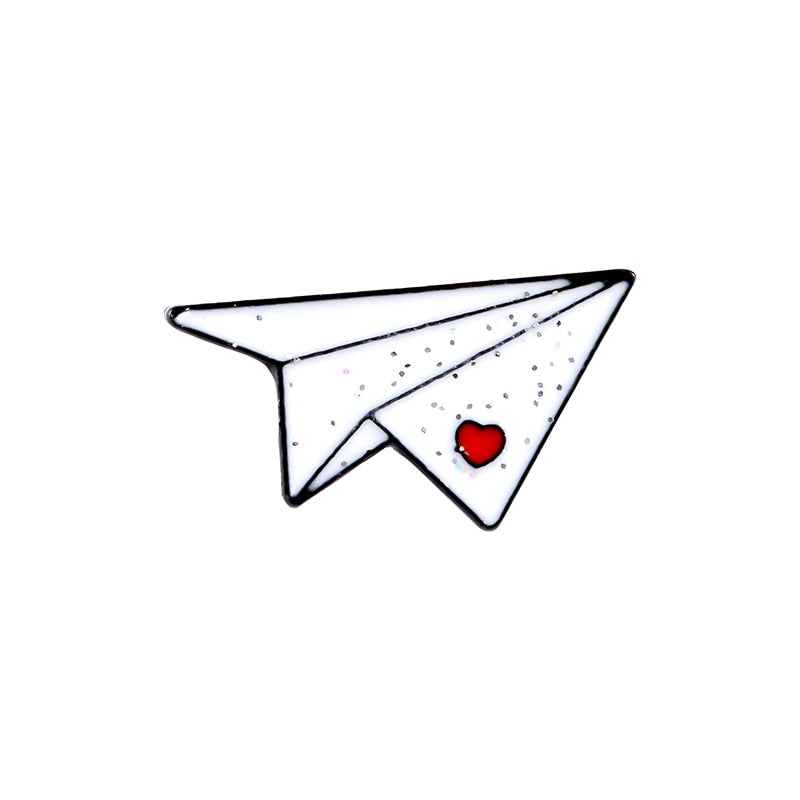 Épingles - avion en papier et bateau
