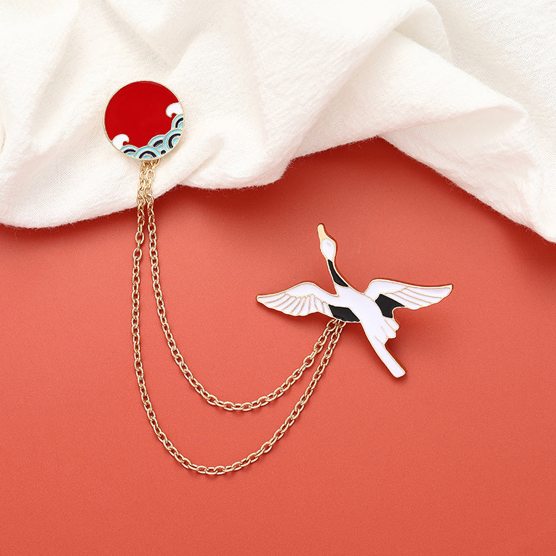 Épingle avec une chaîne - oiseau