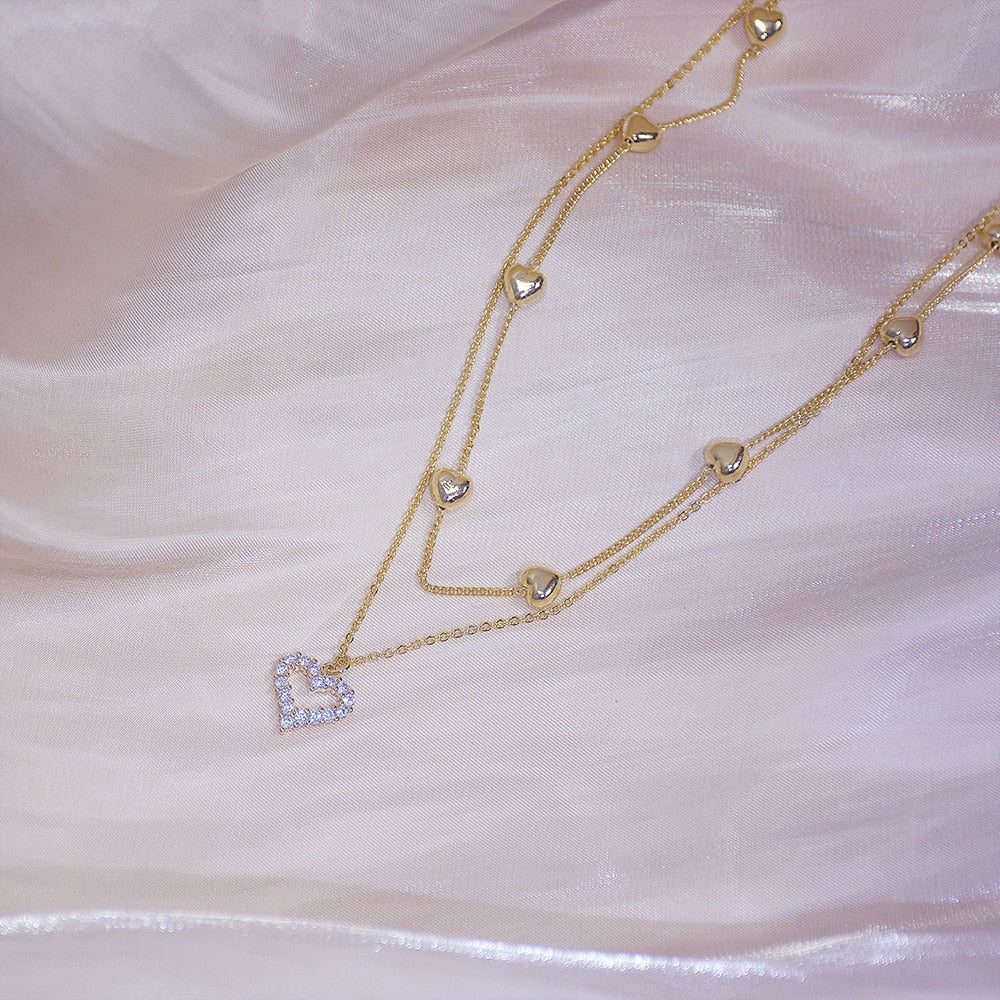 Collier double avec un cœur