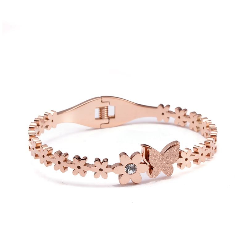 Bracelet avec papillon et fleur