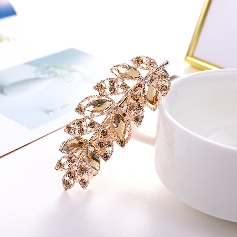 Pince à cheveux avec zircons - brindille avec feuilles