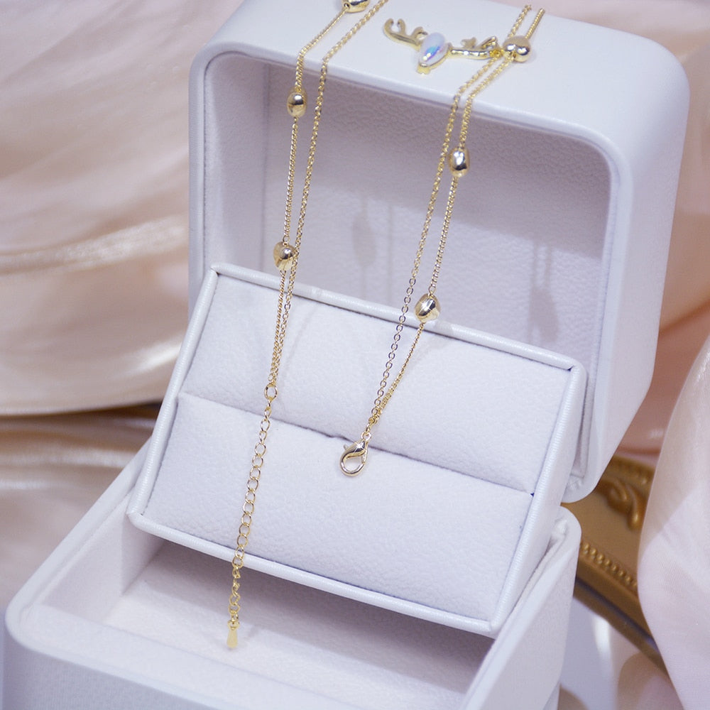 Collier double avec un cœur