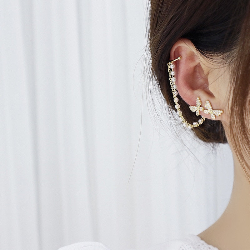 Boucles d'oreilles avec un motif de papillon