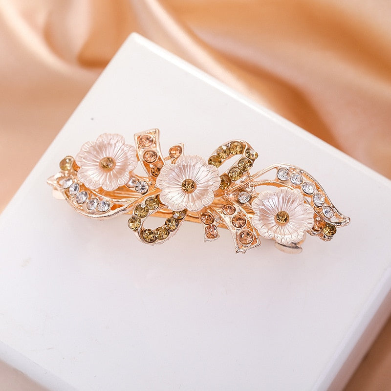 Barrette à cheveux avec des marguerites
