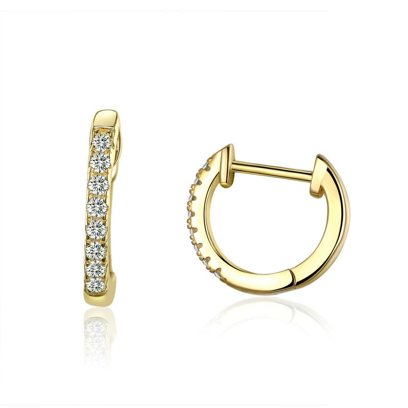 Boucles d'oreilles rondes avec des zircons