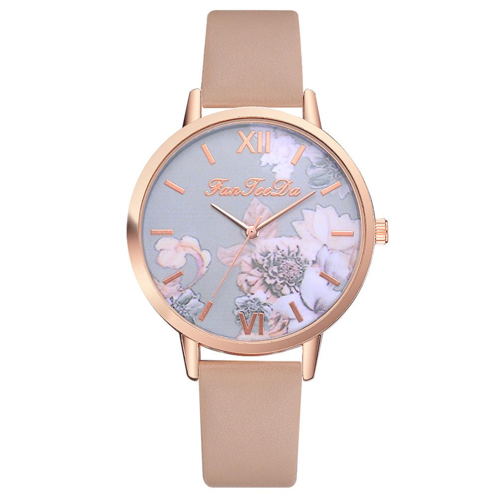 Montre à quartz pour femmes avec motif de fleur