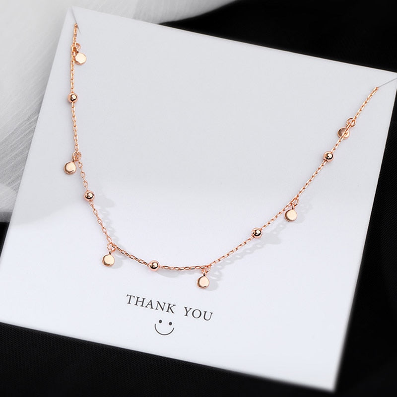 Collier avec de petits pendentifs