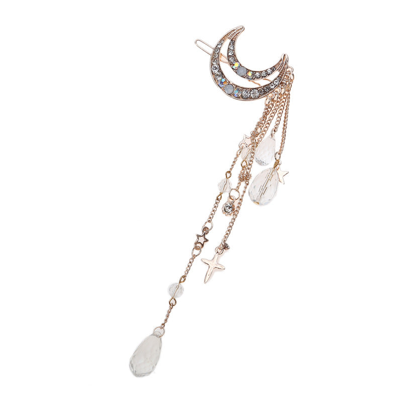 Pince à cheveux en forme de lune avec des perles suspendues