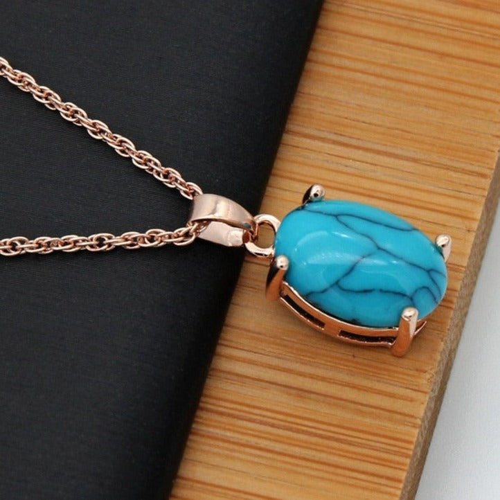 Ensemble de bijoux avec une pierre colorée