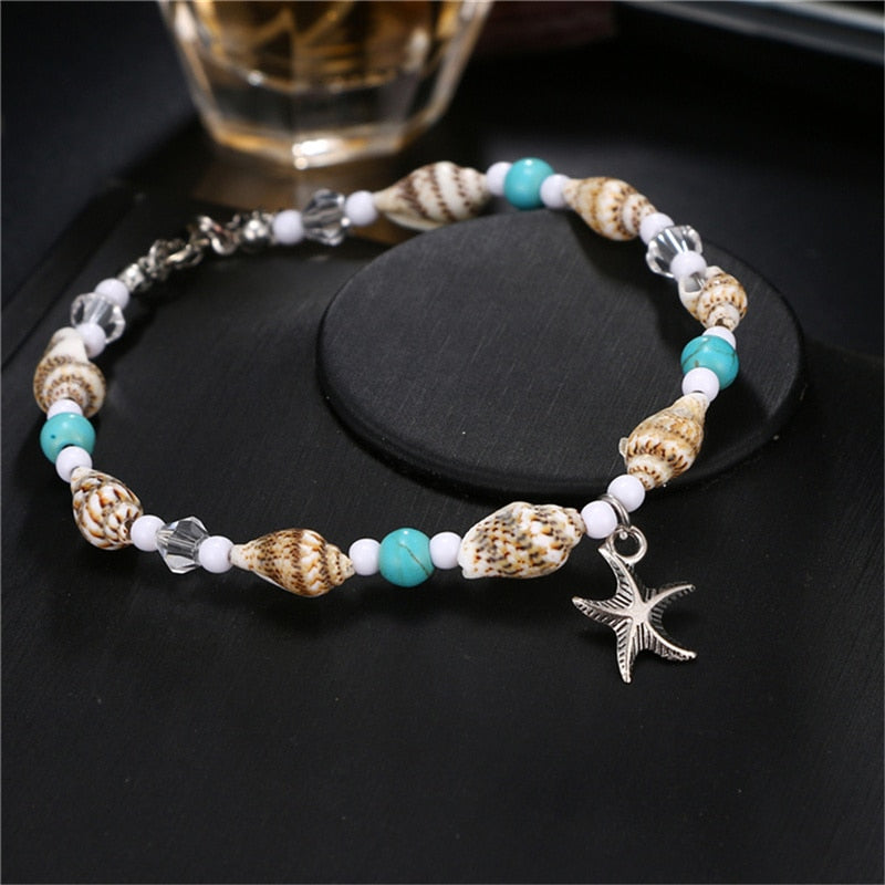 Bracelet de cheville avec des coquillages