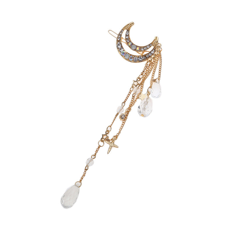 Pince à cheveux en forme de lune avec des perles suspendues